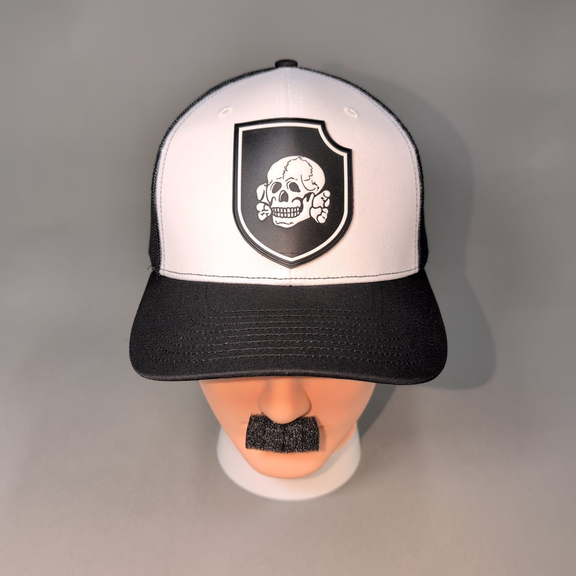Totenkopf Insignia • PVC Patch • White / Black Curved Bill Trucker Cap